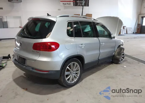 2014 Volkswagen Tiguan Sel из США, поврежденный, VIN WVGAV3AX9EW586927